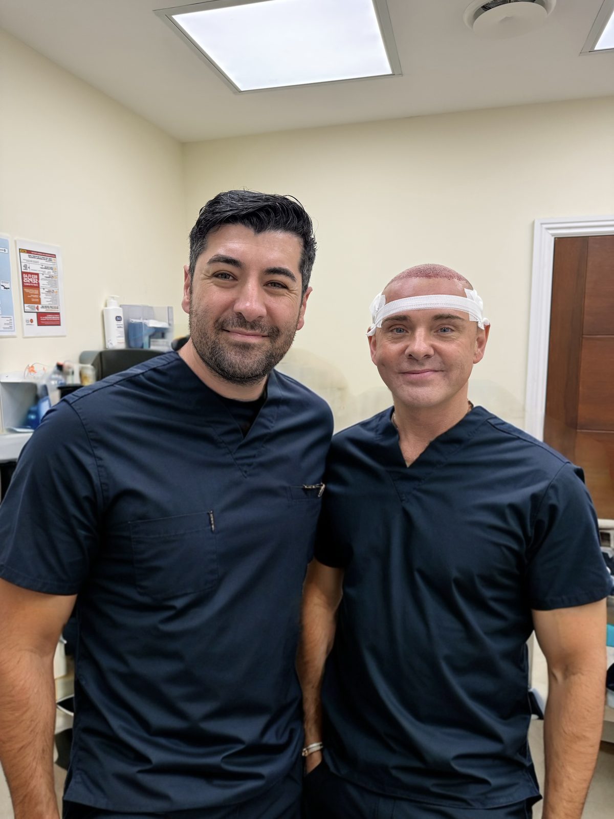 Dr Haydar Bolat with hair transplant patient on procedure day at Tower Bridge Hospital London